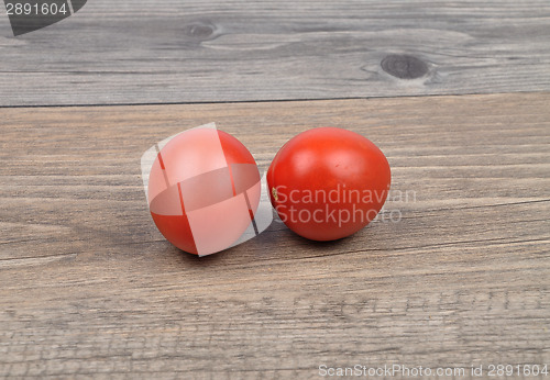 Image of Tomatoes on wood