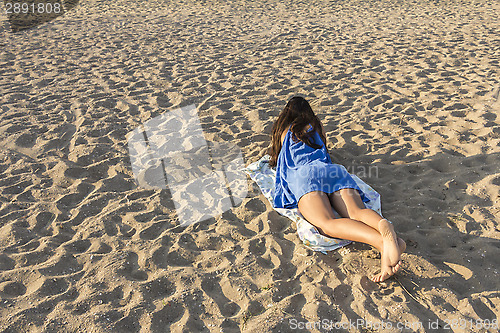 Image of Girl on a sandy beach 