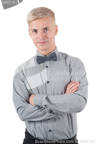 Image of Male standing with crossed arms