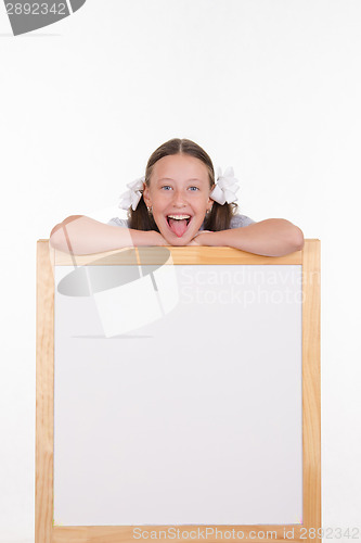 Image of Teen girl with an advertising stand