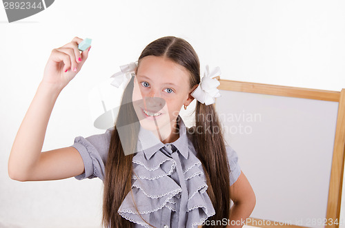 Image of Girl wrote in chalk on a virtual whiteboard