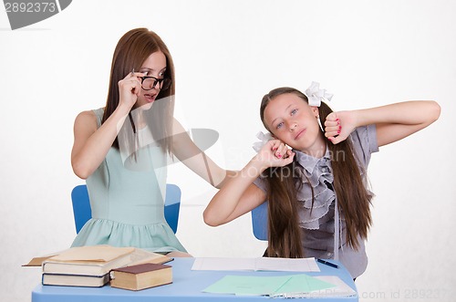 Image of Trainee stretches waking in the classroom