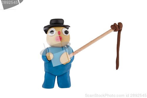 Image of Farmer with whip made of plasticine