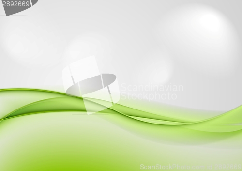 Image of Abstract shiny green waves