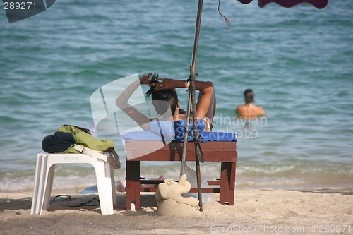 Image of woman on the beach