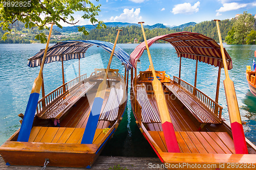 Image of Traditional wooden boats on lake Bled, Slovenia.