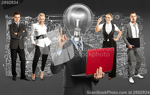 Image of Business Team With Lamp Head