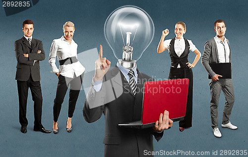 Image of Business Team With Lamp Head