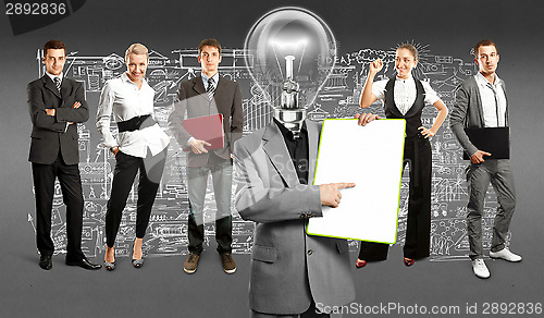 Image of Business Team With Lamp Head