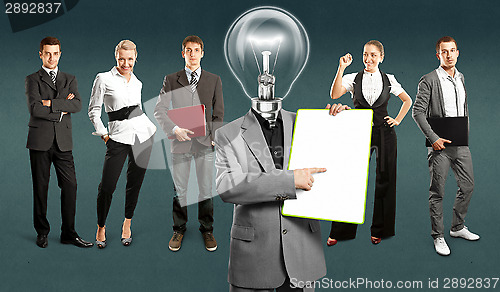 Image of Business Team With Lamp Head