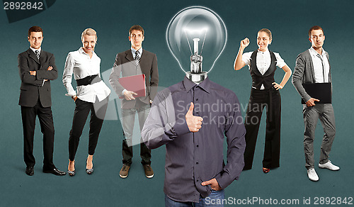 Image of Business Team With Lamp Head