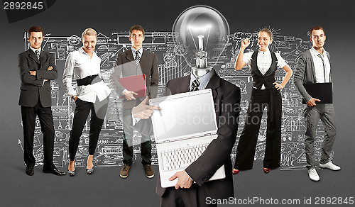 Image of Business Team With Lamp Head