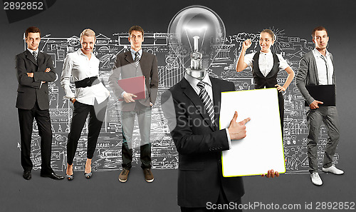 Image of Business Team With Lamp Head