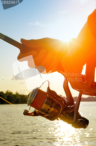 Image of 	Fishing at sunset