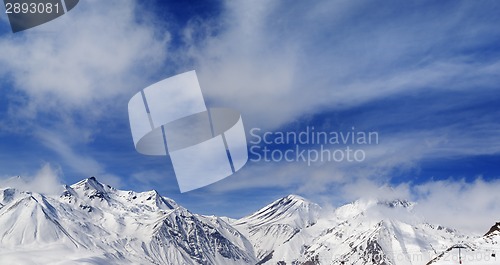 Image of Winter snowy mountains in fog