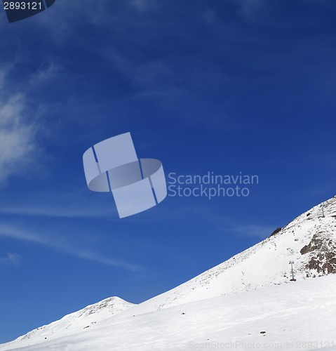 Image of Winter snowy mountains and ski slope