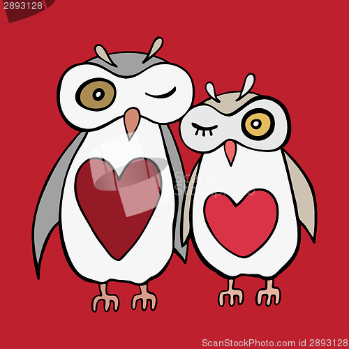 Image of Two cute decorative owls.