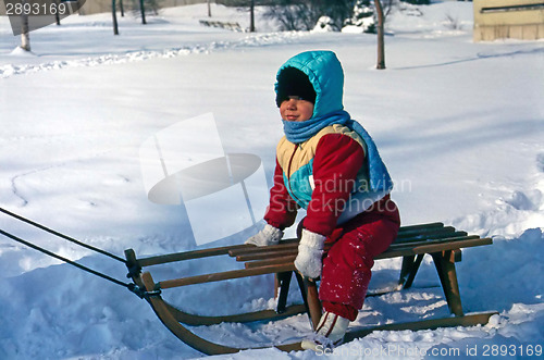 Image of Boy on sledge