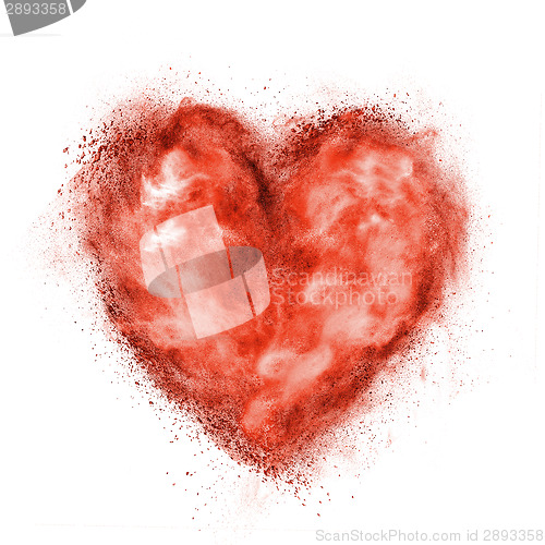 Image of red heart made of black powder explosion isolated on white