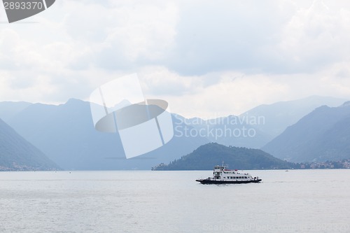 Image of Boat against mountains on Lake Como