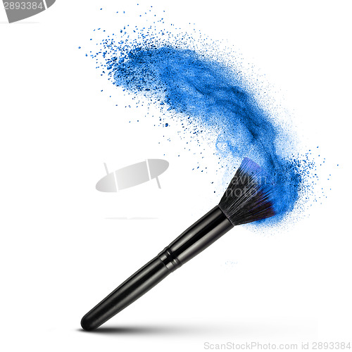 Image of makeup brush with blue powder isolated