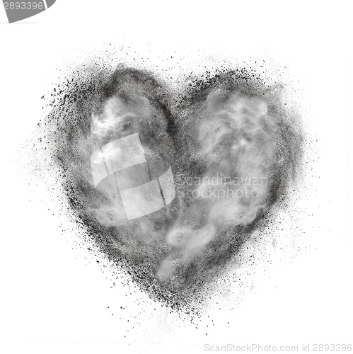 Image of heart made of black powder explosion isolated on white