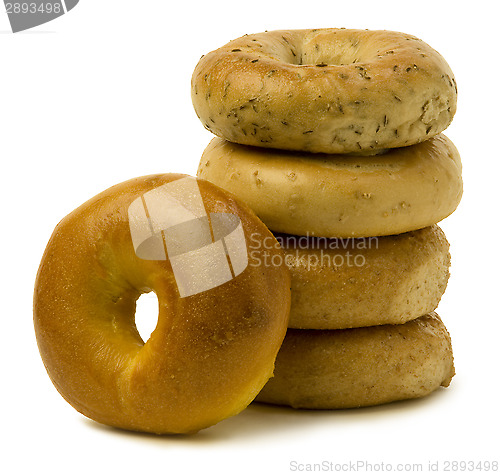 Image of Stack of Four Bagels with OneLeaning on the Side