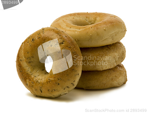 Image of Stack of Three Bagels with One Leaning on the Side 