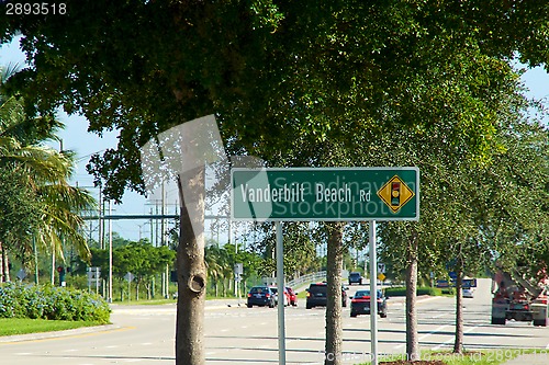 Image of Vanderbilt Beach road sign with traffic