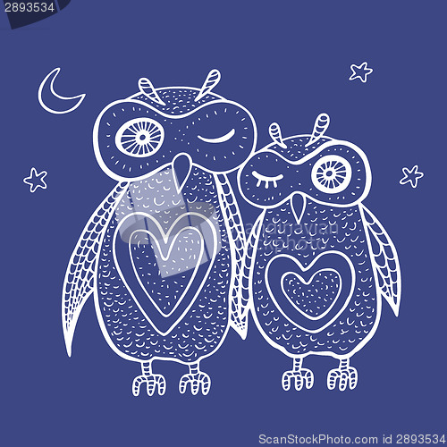 Image of Two cute decorative owls.