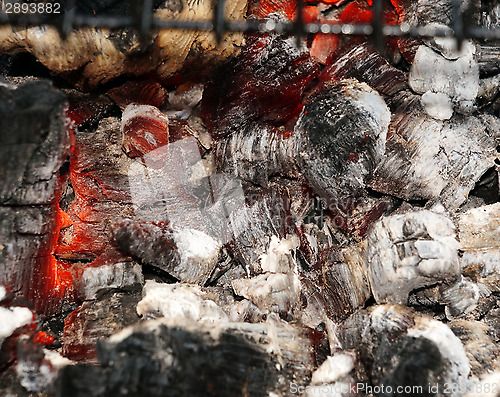 Image of Glowing embers in the ash closeup