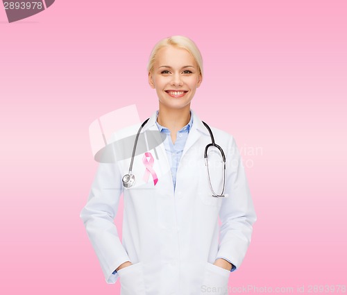 Image of doctor with stethoscope, cancer awareness ribbon