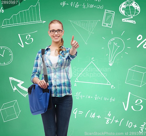 Image of smiling student girl showing thumbs up