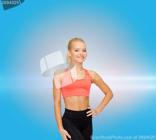 Image of beautiful athletic woman in sportswear