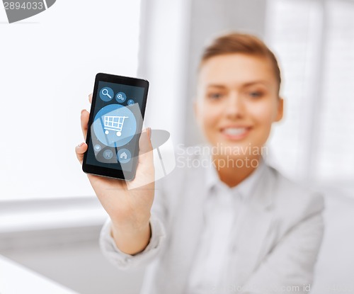 Image of close up of businesswoman with smartphone