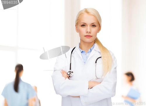 Image of serious female doctor with stethoscope