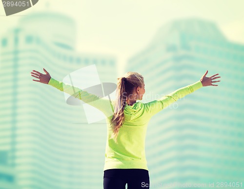 Image of woman doing sports outdoors