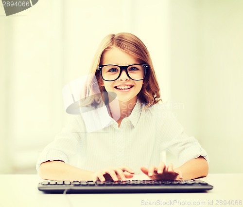 Image of student girl with keyboard