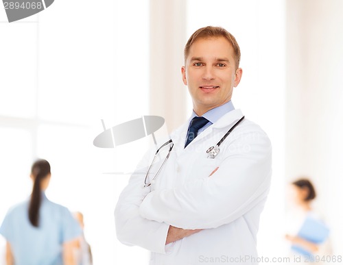 Image of smiling male doctor with stethoscope