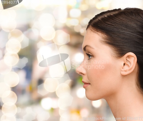 Image of profile portrait of young woman