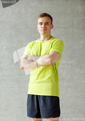 Image of smiling man in gym