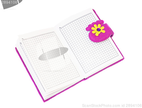 Image of Open notebook in a purple cover on a white background        