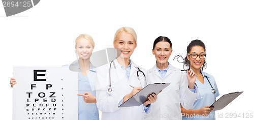 Image of smiling female eye doctors and nurses