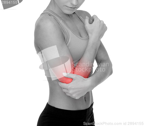 Image of sporty woman with pain in elbow