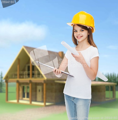 Image of smiling little girl in protective helmet