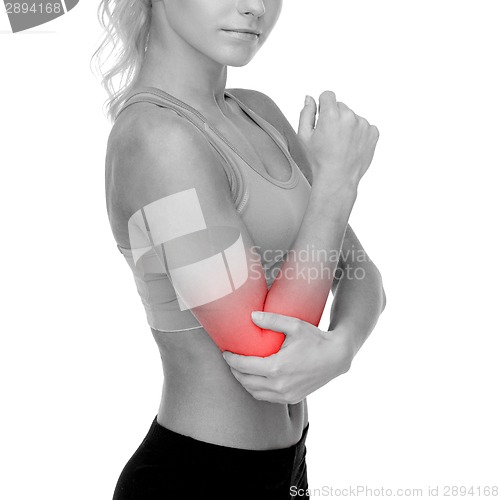 Image of sporty woman with pain in elbow