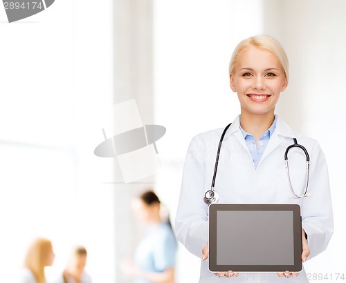 Image of female doctor with stethoscope and tablet pc