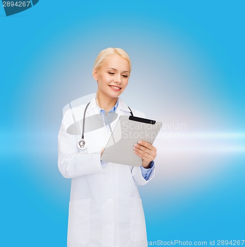 Image of female doctor with stethoscope and tablet pc