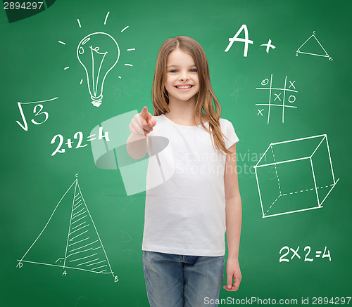 Image of smiling girl in white t-shirt pointing on you