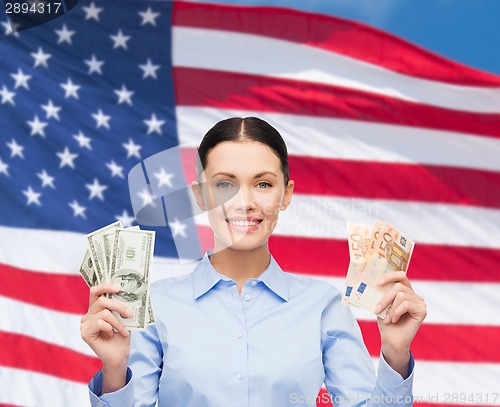 Image of businesswoman with dollar cash money